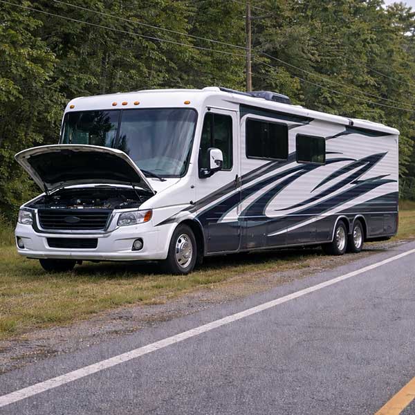 RV - Travel Trailer on the side of the road needing repair