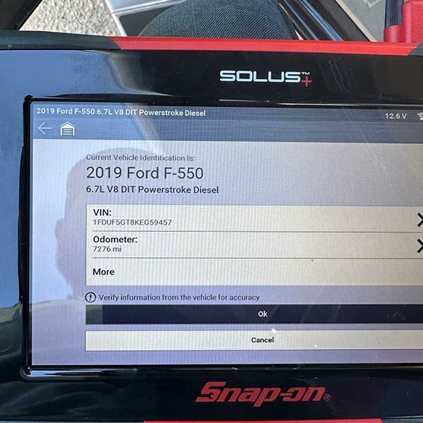 Computer diagnostics on a diesel fleet truck