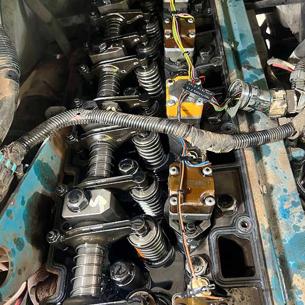 Picture of a fuel injector troubleshooting on roadside