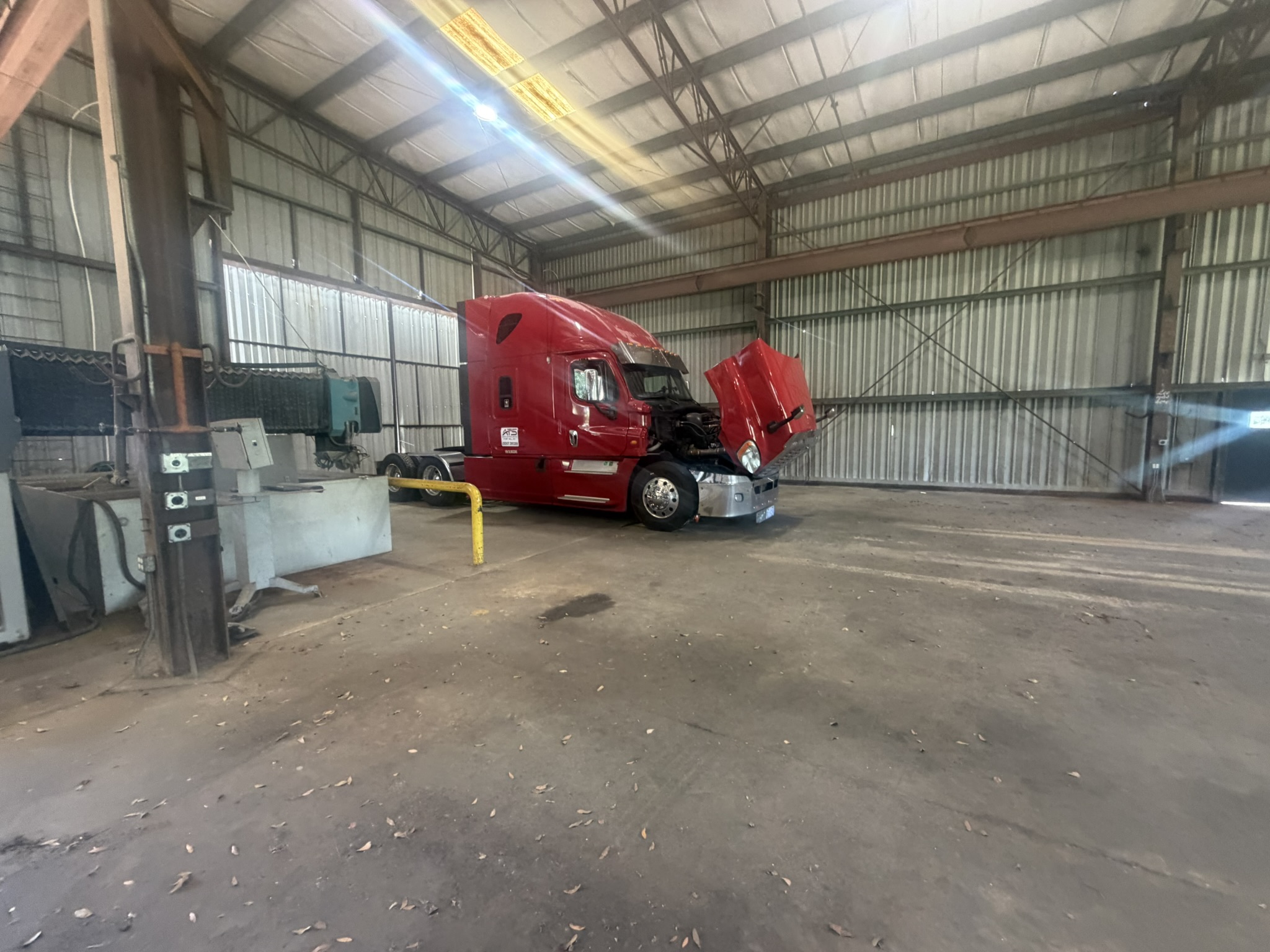 Semi Truck being repaired in Bennett Mobile Truck Repair diesel shop